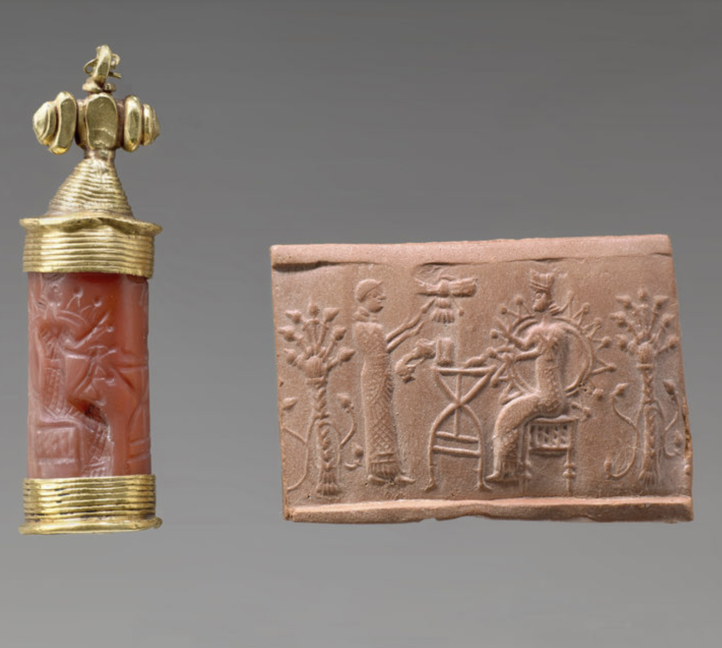 Sceau-cylindre en cornaline d'époque néo-babylonienne (VIe siècle av.), orné d'une monture en or figurant un bouquetin stylisé. L'empreinte révèle une scène de dévotion à une divinité trônant devant une table d'offrandes.   Musée du Louvre, AO 2063