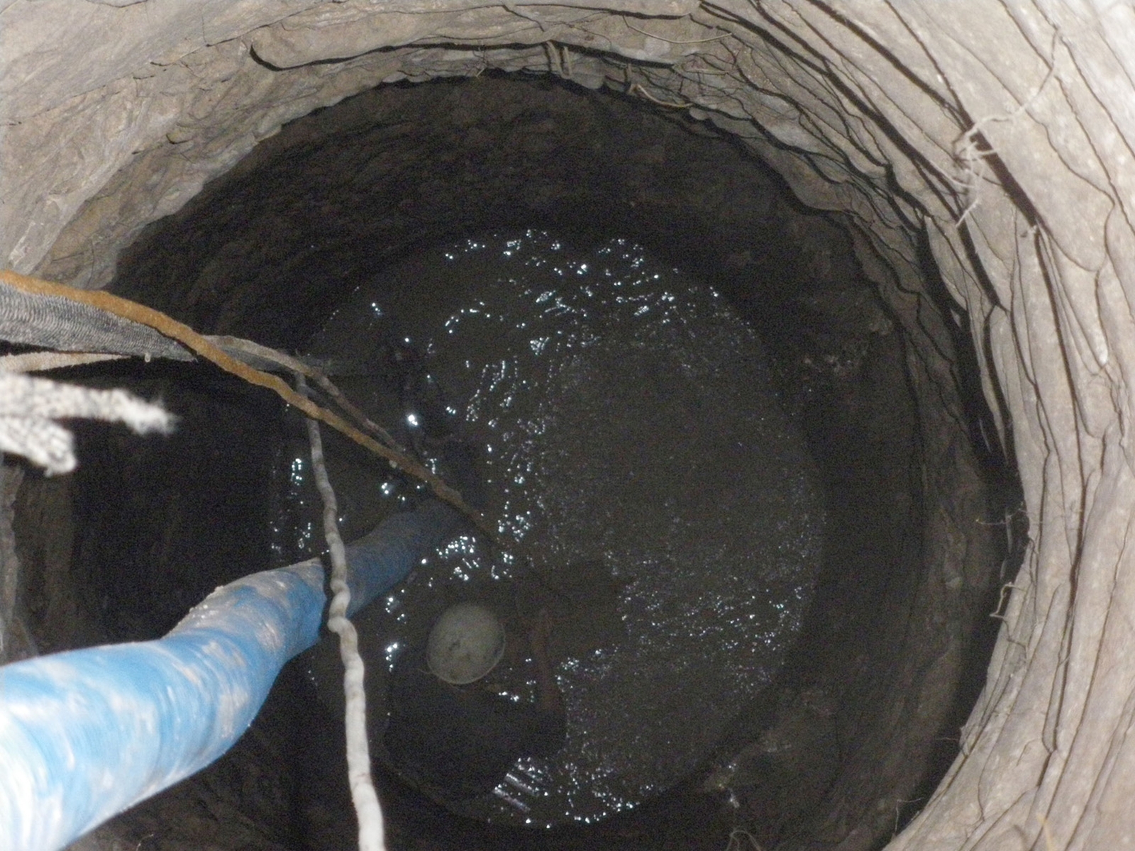 Fouille dans le puits 3150, chantier "Grand-rue"