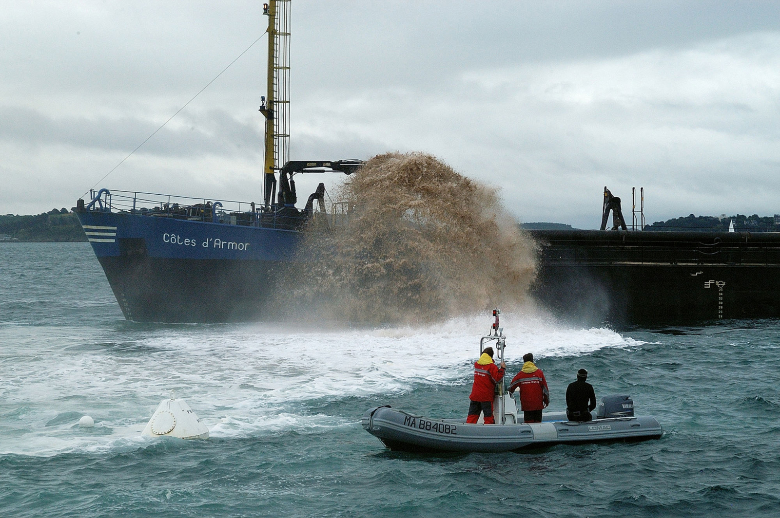Photographie du réensablage du site