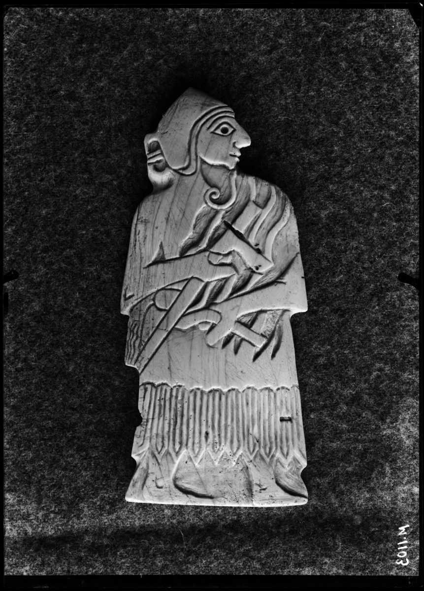 Helmeted warrior armed with an axe