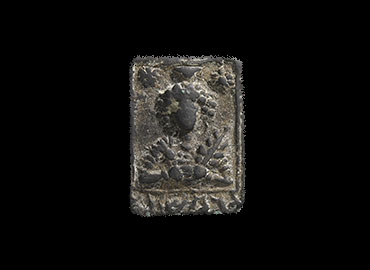 Bust of Bel on a tessera. AO 11762
